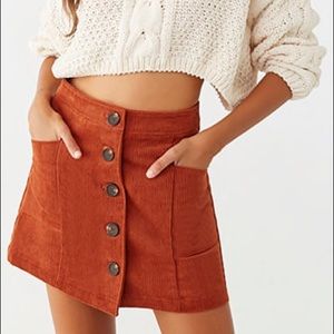 3 for $20 mini burnt orange button front skirt